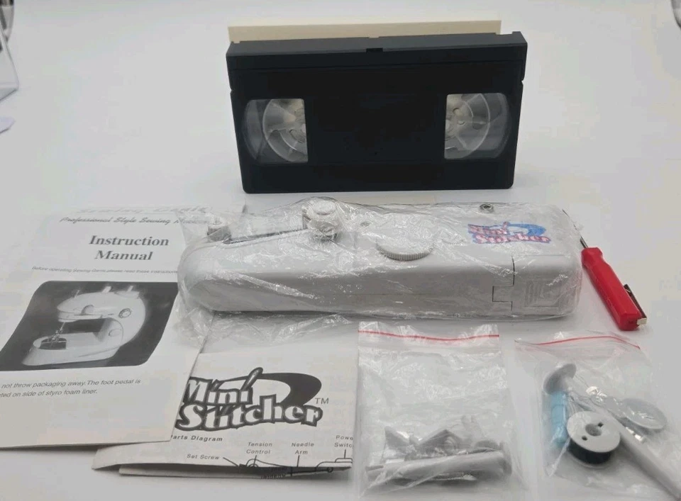 Sewing Genie Mini Stitcher Handheld Sewing Machine w/ Manual, Accessories & VHS - Image 2 of 4
