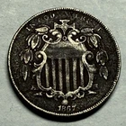1867 U.S. shield nickel. VF details, dark, micro-porosity. #q5