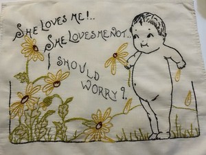 Embroidered Saying With A Kewpie  Doll Pillow Top. 