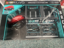 AMG PETRONAS RACING TEAM - Burago 1:43 Formula One Racing Deluxe Paddock New