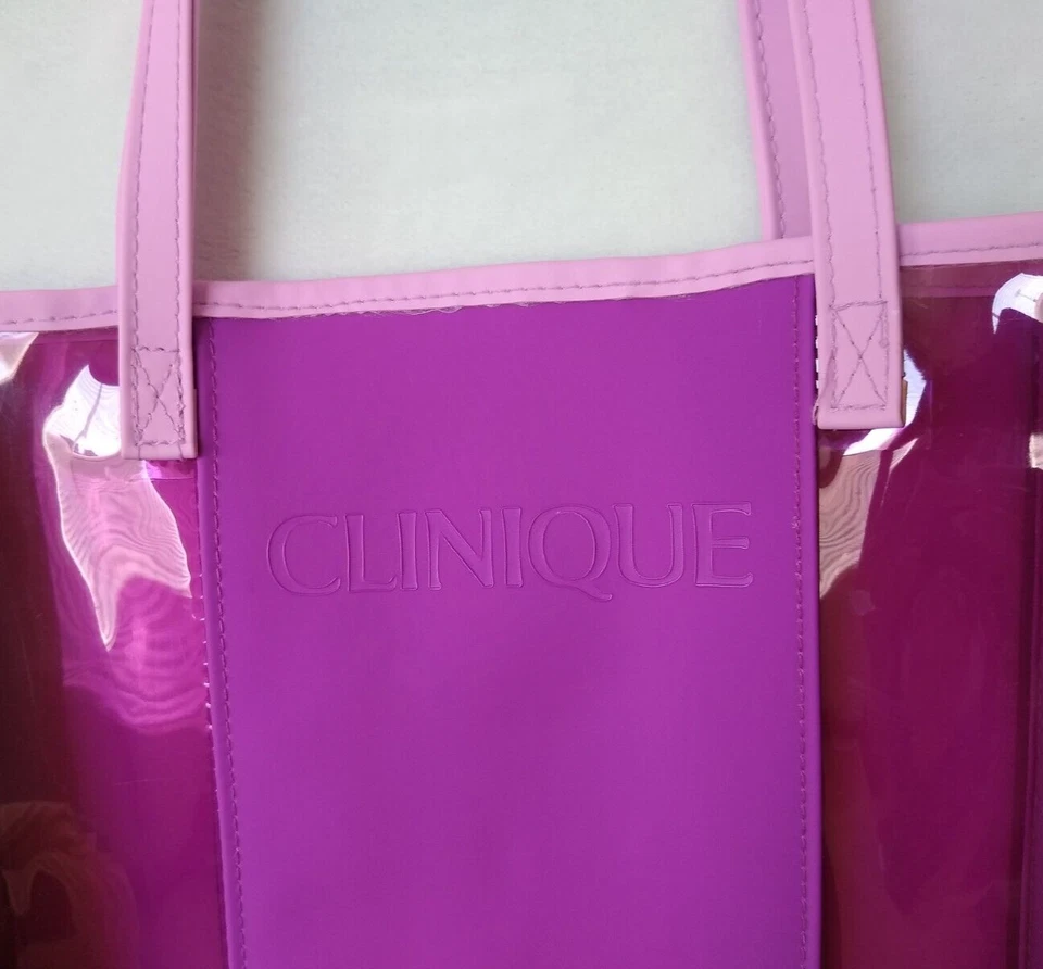 Bolso de Mano Clinique Púrpura con Asas de Vinilo Elegante Transparente Ver a Través 13.5" x 10" x 2".. Foto 3 de 4