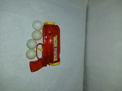vtg red plastic ball shooting toy gun with balls