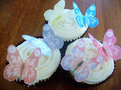 a 12 PRECUT Edible Blue Butterfly wafer/rice paper cake/cupcake toppers