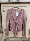 Woman’s pink/rose sexy metallic bodysuit by Lush boutique size L NEW — photo 1