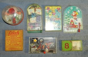 Lot of 7 Vintage Hand-Held Mechanical Games - Wendy's TOMY Copter Flight Leech