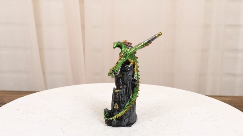 Metallic Golden Green Dragon Guarding Castle Tower On Mountain