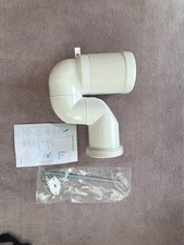 New toilet/WC waste pipe connector with fixings and instruction sheet.