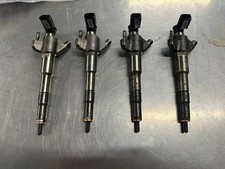 BFD086287 FUEL INJECTORS NISSAN NAVARA NP300 YS23 SIEMENS 166009567R