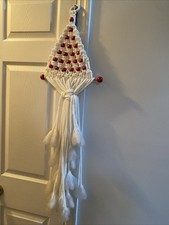 vintage macrame Christmas tree wall hanging with red wooden beads