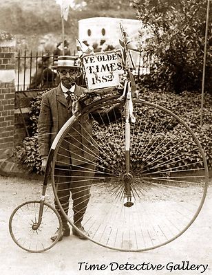 Man with Penny Farthing Bicycle Smoking a Pipe - Historic Photo Print