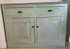 Antique Victorian green painted pine cupboard with two drawers and cabinet