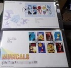 GB QEII FDC x 2. Smilers and Musicals  Hand Cancel (461)