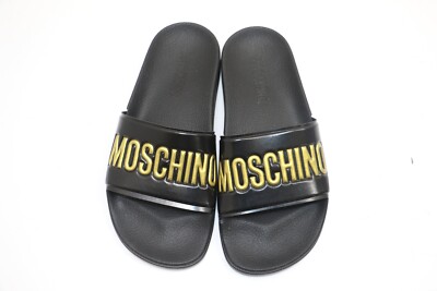 【送料&関税込】Moschino Logo-embossed Slides Moschino Women's Logo Slide Sandal US 6 IT 36 - Black & Gold