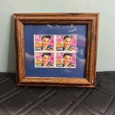 Four Elvis stamps, framed and matted,  6&rdquo; X 6&rdquo;
