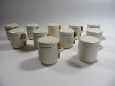 11 Ceramic Airtight Spice / Herb Pots . 8 pots have wooden spoons .6cm high .