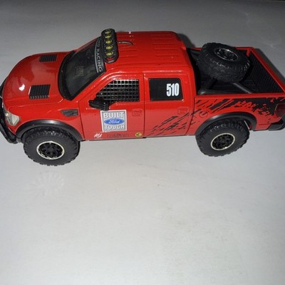 Jada Big Time 4 Wheelin 2011 Ford F 150 SVT Raptor 1:24 Red Built Ford Tough