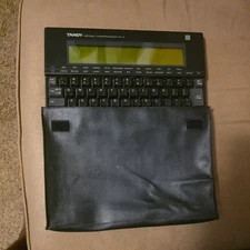 Tandy WP-2 Portable Word Processor - with case, user guide, runs on AA batteries