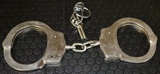 UNUSED GENERIC HANDCUFFS AND KEYS