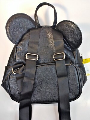 coach disney mini backpack Refined pebble leather Inside multifunction pocket Zip closure fabric lining Top handle with 2 1/2 drop Outside zip pocket Adjustable shoulder strap for crossbody wear 6 (L) x 8 (H) x 3 (W) Mickey Mouse character Coach X Disney - Snow