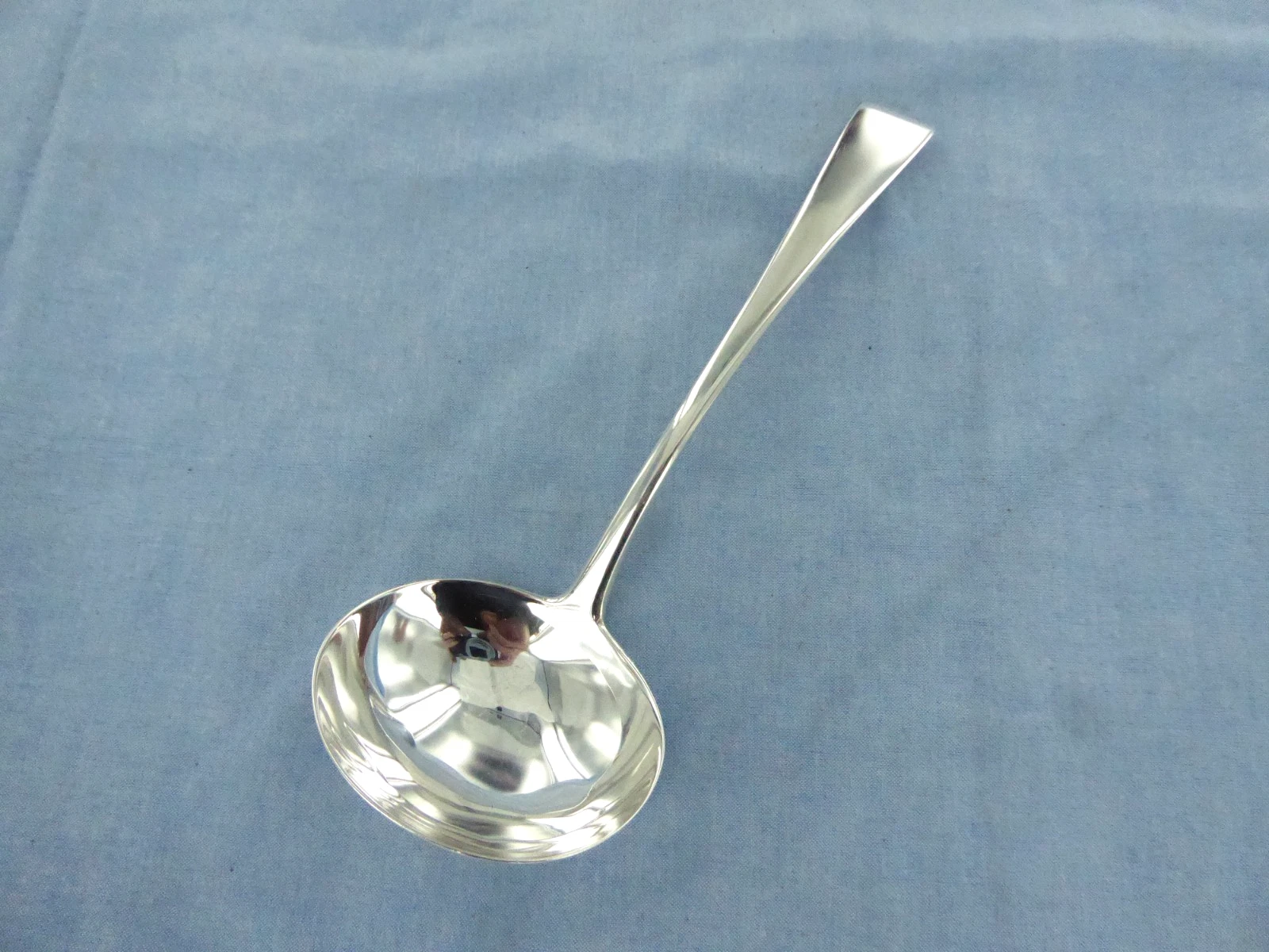 AN ANTIQUE STERLING SILVER, OLD ENGLISH SAUCE LADLE. LONDON 1801.