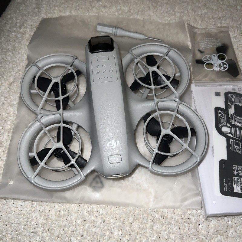 DJI Neo  Ready to Fly Drone with Propeller Guards, Spare Propellers