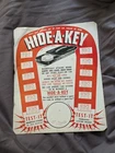 1950’s Vintage Retro Hide-A-Key Metal Advertising Store Display Countertop Sign