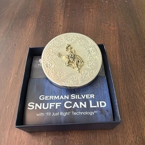 Montana Silver Saddle Bronc snuff can lid. New