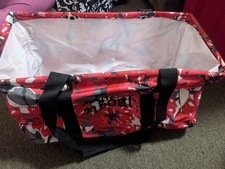 THIRTY ONE medium tote with multiple pockets on the outside .
