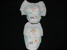 4 Pampers size 9 pants 41 Lbs. made to fit 32 in waist easy.