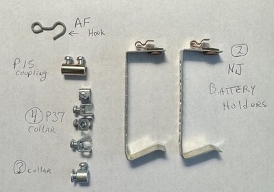 Gilbert Erector: Parts battery Holder Brackets, P 15 Coupling, P 37 Collar, hook