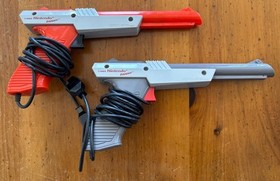 Lot of (2) Nintendo NES-005 Zapper Light Guns Controllers 1985 Grey & Orange