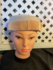 Vintage tan straw pillbox hat with pleated ribbon band.