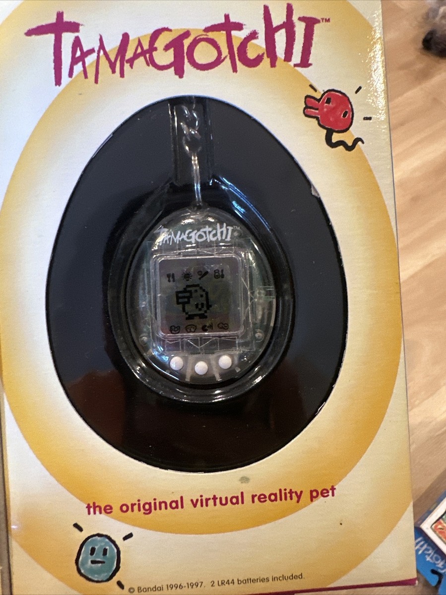 vintage 1996-1997 Bandai Tamagotchi - #1800 clear White- BRAND NEW