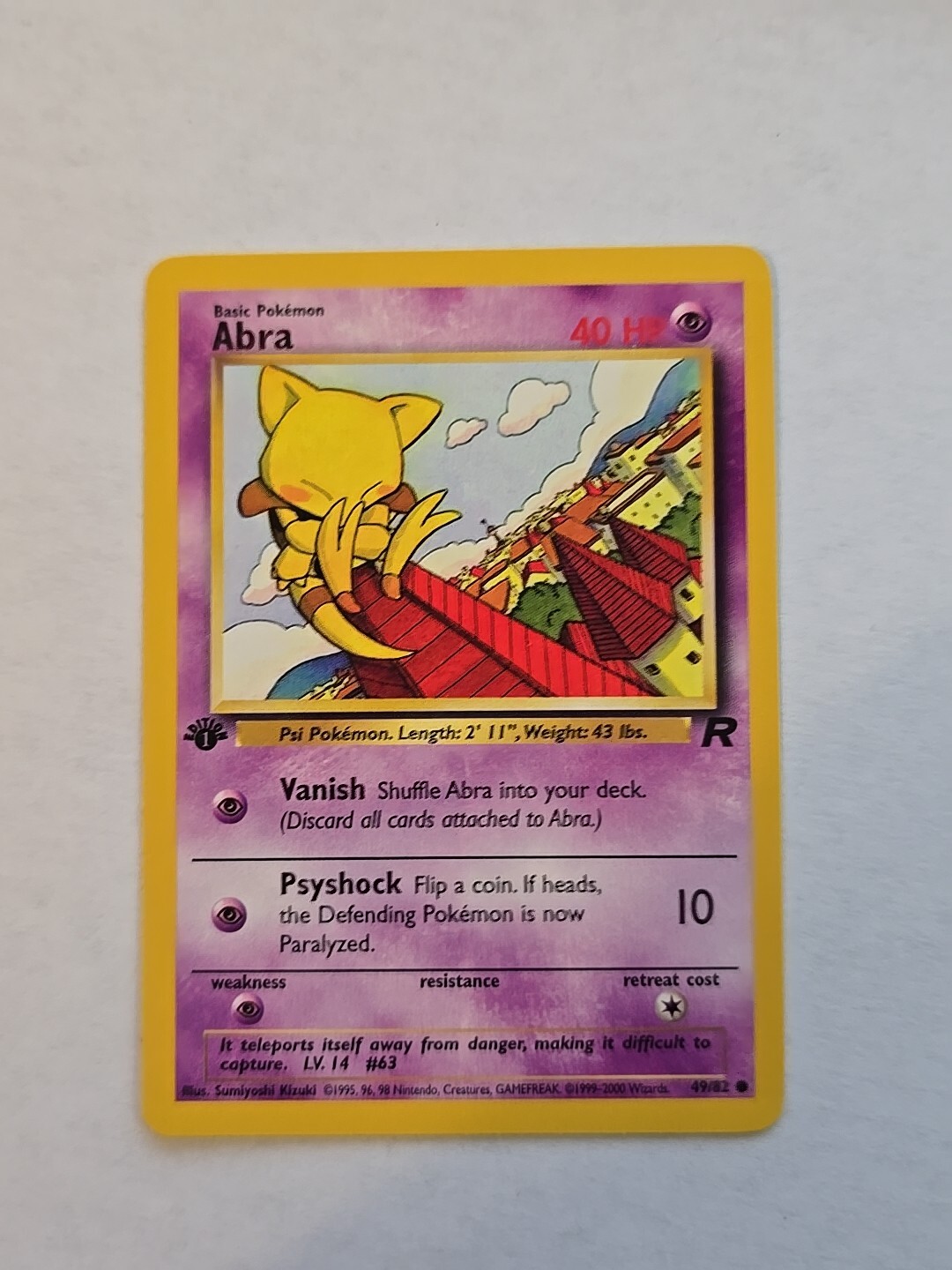 1st Edition Abra 49/82 - Team Rocket - Common Pokemon Card - Near Mint (NM)