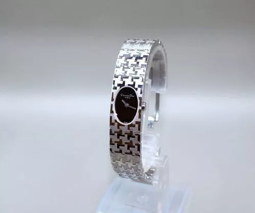 Montre Dior D70 100 cadran noir ton argent pour femme d'occasion avec boîte et liens