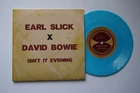 DAVID BOWIE x EARL SLICK -  ISN'T IT EVENING LIMITED 7” TURQUOISE VINYL SINGLE
