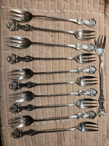 A Stowell Sterling silver forks 12