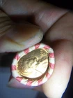 WHEAT PENNY ROLL WITH A BU 1955-S WHEAT PENNY SHOWING