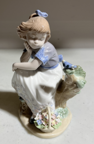NADAL GIRL SITTING ON STUMP WITH FLOWERS Bird Limited Edition #2540