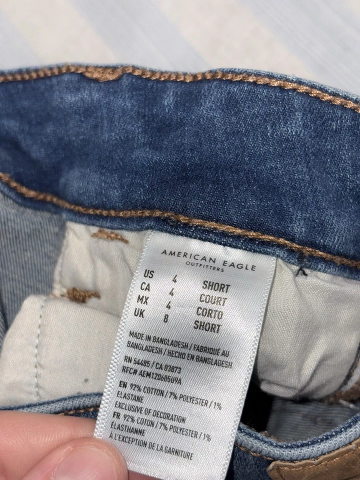 Pantalones de mezclilla para mujer American Eagle de tiro alto 4 cortos rasgados elásticos Next Level Foto 4 de 4