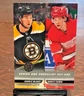 2022-23 Upper Deck French Charlie McAvoy/Moritz Seider Boston Bruins/Detroit Red