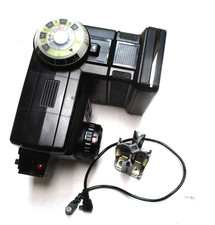 Vivitar model 285 flash unit and acc. as shown. Clean and tested.