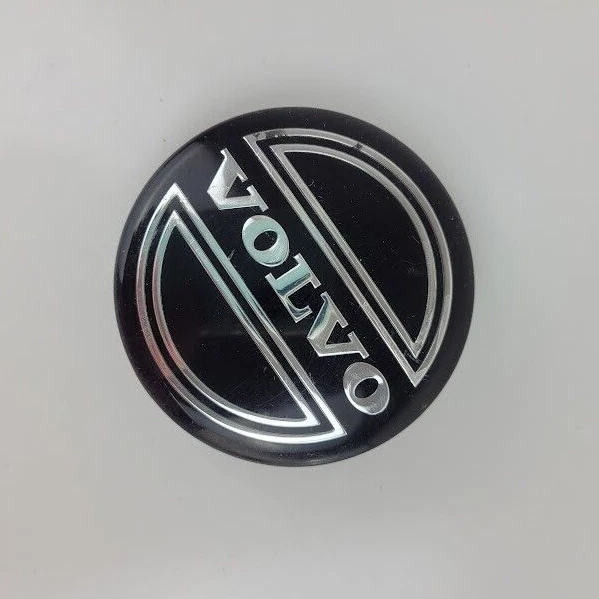 Tapacubos central de rueda Volvo S60 2005 negro único (1) OEM Foto 2 de 4