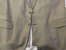 Aquascutum of London blazer featuring a gray and brown houndstooth pattern