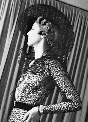 Model wearing a dress and a hat 'Royal Ascot' at an exhibition Br- 1937 Photo