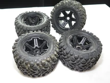 TRAXXAS REVO 3.3 NITRO (4) MOUNTED TIRES WHEELS