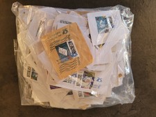 Beutel mit circa  260 Gramm Briefmarken doppelt grob ausgerissen, Beispielfotos