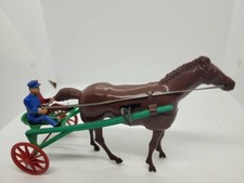 NICE VINTAGE 1950's WOLVERINE PLASTIC WIND UP JOCKEY and RACE HORSE