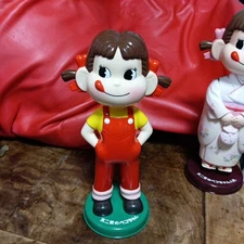Fujiya's Peko-chan swing doll brand new