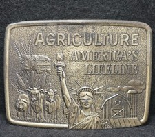 XB01137 VINTAGE 1970s AGRICULTURE AMERICA'S LIFELINE FARMING BRASS BELT BUCKLE